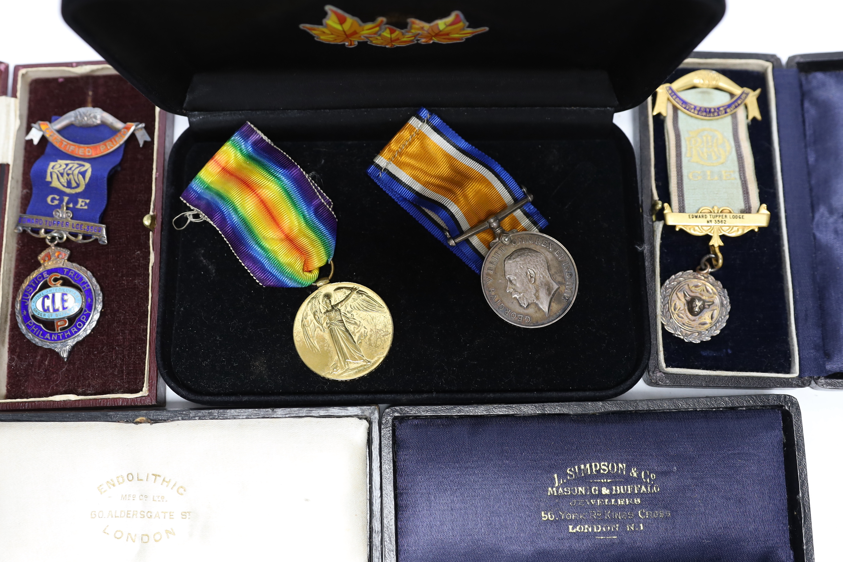 WWI trio awarded to CMT - 735 PTE A E COX ASC, three cased silver Masonic medals, two with enamel together with another empty Masonic related case